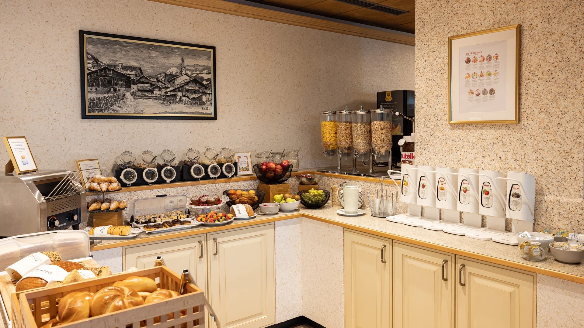 Breakfast buffet with bread, fruit, cereal and drink dispensers