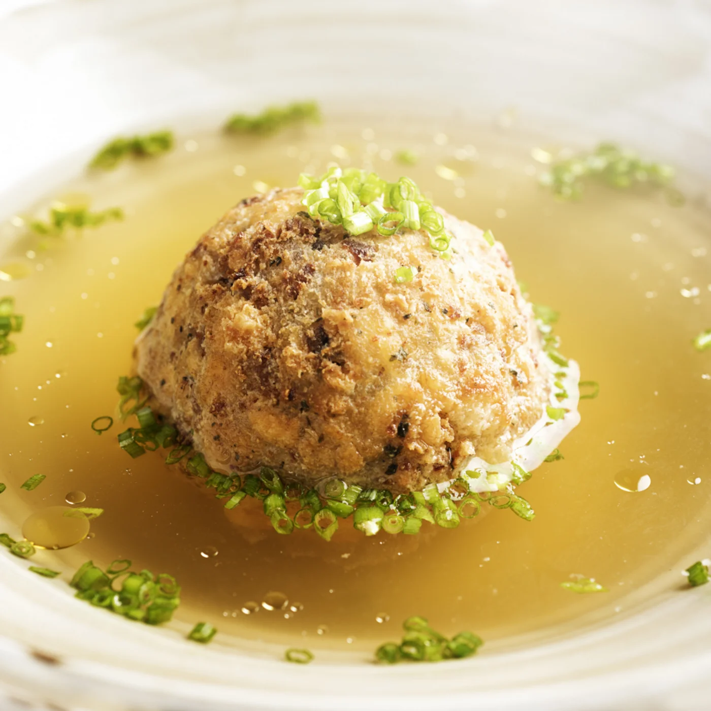 Alphof | genuine indulgence at a gourmet hotel in Tyrol Meat dumpling in clear broth with chives